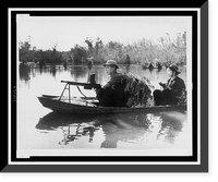 Historic Framed Print, Viet Cong guerrillas in small boats patrol the Saigon River in South Vietnam,  17-7/8" x 21-7/8"