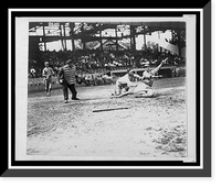 Historic Framed Print, [Umpire makes the call as the catcher applies tag to ball player sliding into home plate during a baseball game],  17-7/8" x 21-7/8"