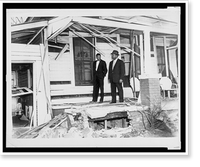 Historic Framed Print, [Reverend Ralph Abernathy (right) and Reverand W.J. Hudson, standing on the porch of Abernathy's home, view damage from bomb explosion January 10th 1957],  17-7/8" x 21-7/8"
