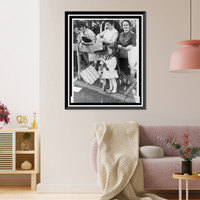Historic Framed Print, [Bystanders, including girl in traditional Greek dress, enjoying parade].World Telegram & Sun photo by Stanley Wolfson.,  17-7/8" x 21-7/8"