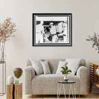 Historic Framed Print, Authorities remove one of three bodies from an ambulance at the University Medical Center,  17-7/8" x 21-7/8"