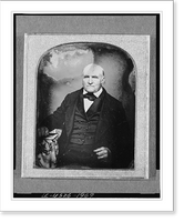 Historic Framed Print, [Unidentified man, three-quarter length portrait, facing front, seated beside table with tablecloth, holding book],  17-7/8" x 21-7/8"