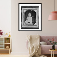 Historic Framed Print, [Unidentified girl, three-quarter length portrait, facing front, seated in chair, holding a daguerreotype case(?)],  17-7/8" x 21-7/8"