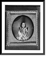 Historic Framed Print, [Unidentified girl, three-quarter length portrait, facing front, seated in chair, holding doll],  17-7/8" x 21-7/8"