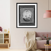 Historic Framed Print, [Occupational portrait of a blacksmith, three-quarter length, facing front, holding a horseshoe with pliers in one hand, and a hammer in the other],  17-7/8" x 21-7/8"
