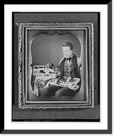 Historic Framed Print, [Occupational portrait of a salesman, three-quarter length, seated, displaying his wares],  17-7/8" x 21-7/8"