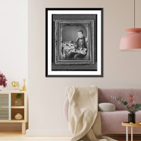 Historic Framed Print, [Occupational portrait of a salesman, three-quarter length, seated, displaying his wares],  17-7/8" x 21-7/8"