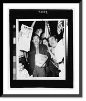Historic Framed Print, [Chinese newspaper vendor, among crowd of people waving American flags in Chinatown, New York City, holds newspaper, The China Tribune, announcing surrender of the Japanese in 1945],  17-7/8" x 21-7/8"