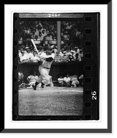 Historic Framed Print, [New York Yankees catcher Yogi Berra posed and ready to swing at baseball during spring training baseball game].Newman.,  17-7/8" x 21-7/8"