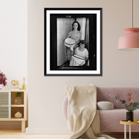Historic Framed Print, [Two young women, three-quarter length portrait, one seated and one standing, with their embroidery in Ibiza],  17-7/8" x 21-7/8"