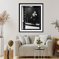 Historic Framed Print, [Gorgeous George, full-length portrait, standing in wrestling ring, facing left],  17-7/8" x 21-7/8"
