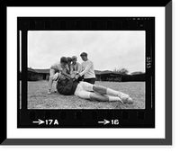 Historic Framed Print, [Mickey Mantle holding football as sons attempt to wrest it from him].Thomas R. Koeniges.,  17-7/8" x 21-7/8"