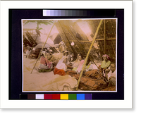 Historic Framed Print, [People seated with stacks of tobacco leaves(?) under shelter, Philippines],  17-7/8" x 21-7/8"