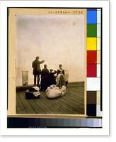 Four immigrants and their belongings, on a dock, looking out over the water; view from behind - 2, Historic Print
