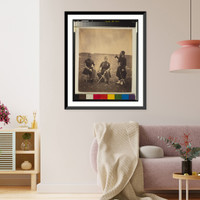 Two French officers, seated, and Zouave, standing with arm resting on rifle, Vintage Poster