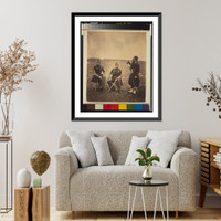 Two French officers, seated, and Zouave, standing with arm resting on rifle, Vintage Poster