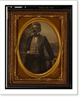 Historic Framed Print, [Unidentified man, three-quarters length portrait, standing in front of painted backdrop],  17-7/8" x 21-7/8"