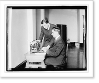 Unidentified men using typing machine, Historic Print