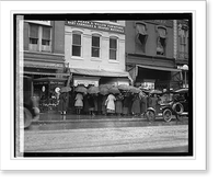 Rear view of group of women with umbrellas standing outside of store, Antique Print