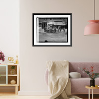 Historic Framed Print, Racing returns crowd,  17-7/8" x 21-7/8"