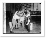 Robert Ellen pulling tooth of baby elephant, 11/3/24, Vintage Print