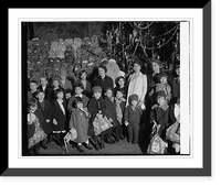 Historic Framed Print, Mrs. Coolidge distributes Xmas bags for Central Union Mission, [12/24/25],  17-7/8" x 21-7/8"