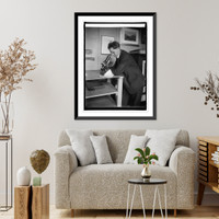 R.P. Tolman at museum, with letter in eye of needle, 12/17/24, Vintage Print