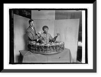 Historic Framed Print, Wm. H. Egberts of Nat'l Museum with Siamese musician, 5/11/25,  17-7/8" x 21-7/8"