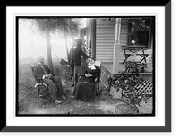 Historic Framed Print, [Unidentified men and woman seated in yard next to house],  17-7/8" x 21-7/8"