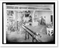 Historic Framed Print, Carton Machine. Also showing filling and sewing 25 lb. sacks in background of picture,  17-7/8" x 21-7/8"