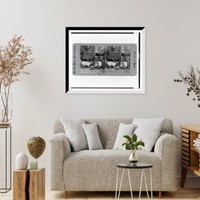 Historic Framed Print, [Dog looking at monkey with ball of yarn]. Leander Baker photographer.,  17-7/8" x 21-7/8"