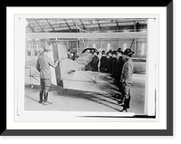 Historic Framed Print, Studying plane rudder,  17-7/8" x 21-7/8"