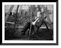 Historic Framed Print, J.C. Smith sitting outdoors, smoking,  17-7/8" x 21-7/8"