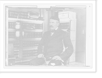 Historic Framed Print, J.M. Ward, seated in study,  17-7/8" x 21-7/8"
