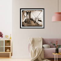 Historic Framed Print, James River Va. Deck of iron-clad gunboat Galena showing stack damaged by fire from,  17-7/8" x 21-7/8"