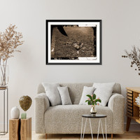 Historic Framed Print, Antietam Maryland. A Confederate soldier who after being wounded had evidently drag,  17-7/8" x 21-7/8"