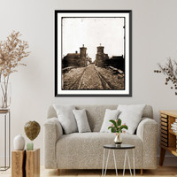Historic Framed Print, Saint Augustine Fla. Entrance gate with street and houses beyond,  17-7/8" x 21-7/8"
