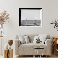 Historic Framed Print, Columbia setting spinnaker and Shamrock, after start,  17-7/8" x 21-7/8"