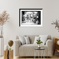 Historic Framed Print, Group of people around "Consul Peter" - a monkey who is smoking on a boat,  17-7/8" x 21-7/8"
