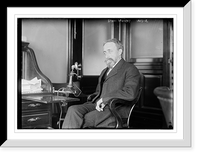 Historic Framed Print, Starr Murphy seated at desk with telephone,  17-7/8" x 21-7/8"