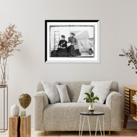 Historic Framed Print, Miss Sperder, seated with another lady, holding newspaper,  17-7/8" x 21-7/8"