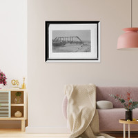 Carriage and wagon crossing bridge over river bluff, Antique Poster