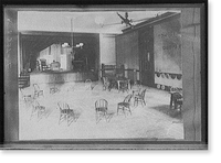 Interior with stage and chairs in circle, Historic Reproduction
