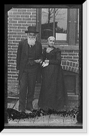 Father and mother of William Henry Jackson, full-length portrait in front of house, Vintage Poster
