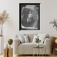 Historic Framed Print, [Girl in pantaloons standing by bench],  17-7/8" x 21-7/8"