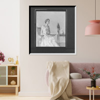Lady sitting on chair next to parrot, Historic Reproduction