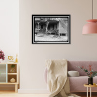 Historic Framed Print, INDIAN HEAD, MD. NAVY PROVING GROUND. RESIDENCE OF GEORGE SWANN, DAMAGED BY 16' SHELL THAT HIT ANOTHER IN SANDBANK, AND WAS DEFLECTED OVER COUNTRY AT 3/4 ANGLE. THE SHELL, WHERE IT STOPPED IN DOORYARD,  17-7/8" x 21-7/8"
