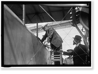 NATIONAL AERO COAST PATROL COMMN. CURTISS BIPLANE 2 ENGINES, WITH FLOATS, EXHIBITED AT S.O.B. SEN. BEN TILLMAN CLIMBING INTO PLANE; AUGUSTUS POST AT RIGHT, Historic Reproduction