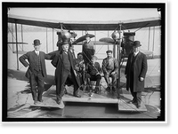 RICHARDSON TANDEM BIPLANE HYDROPLANE ON POTOMAC, APRIL, 1916. GEORGE A. GRAY AT CONTROLS. AT LEFT AND RIGHT ARE RICHARDSON BROTHERS WHO BUILT THE PLANE; 2ND FROM LEFT IS THEIR UNCLE, WHOSE IDEA IT