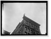 REYNOLDS, J., PERFORMING ACROBATIC AND BALANCING ACTS ON HIGH CORNICE ABOVE 9TH STREET, N.W. Classic, Vintage Print